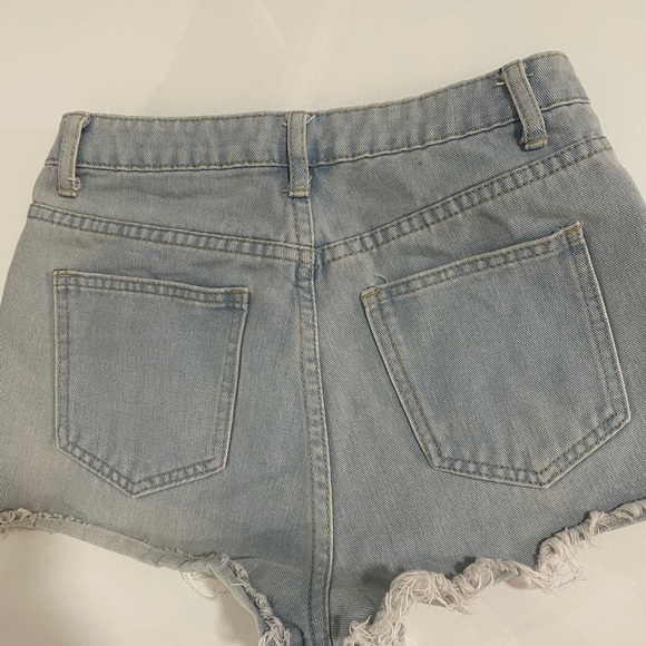 Jean size Xs. Color blocking Jean shorts. - Picture 2 of 3